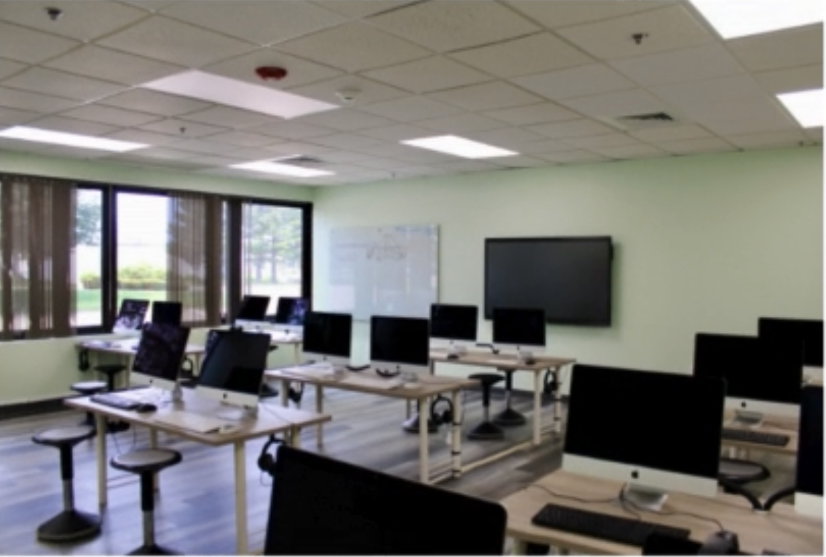 New computer lab with workstations and smartboard