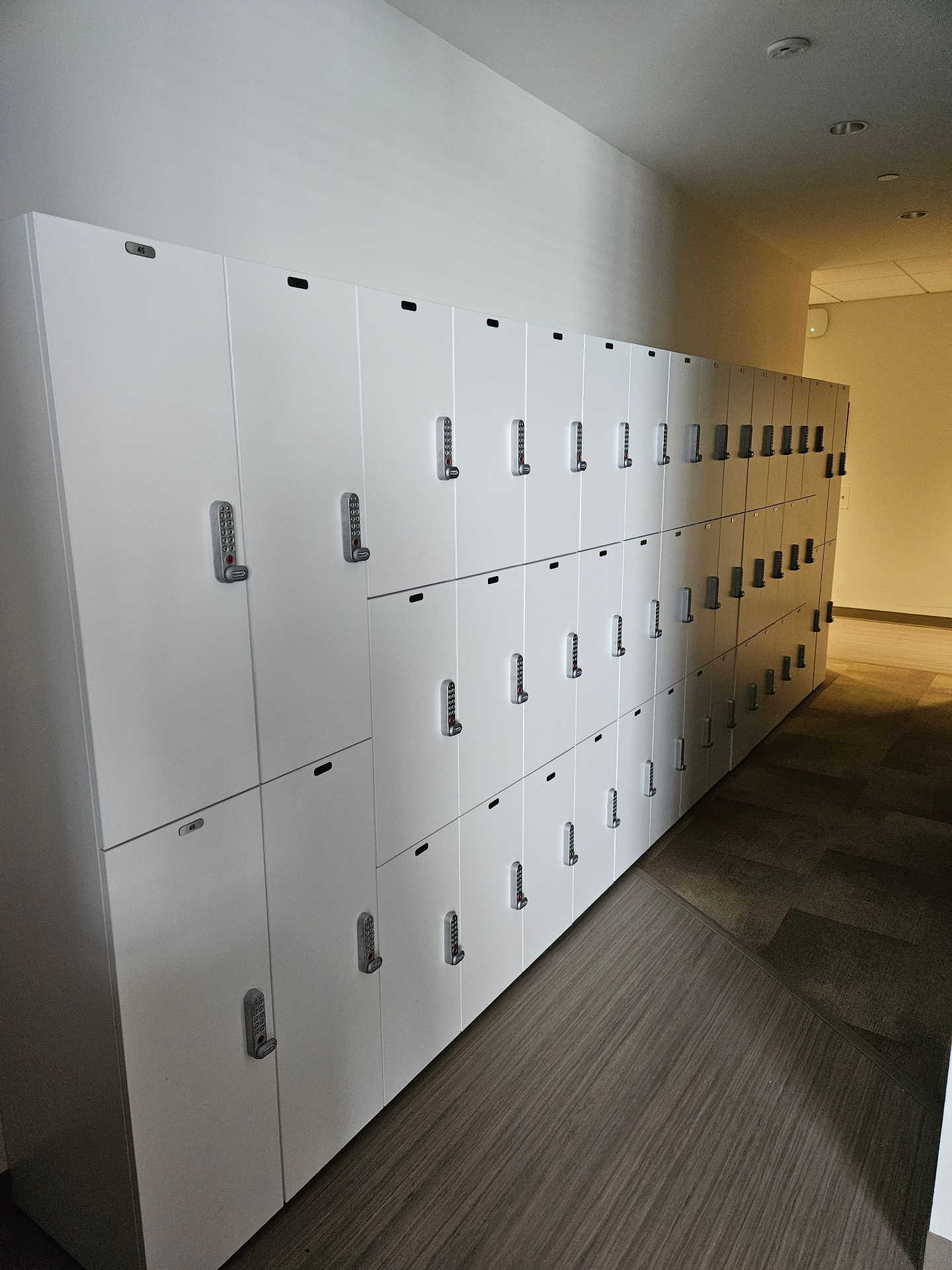 Wall of keypad-secured student lockers